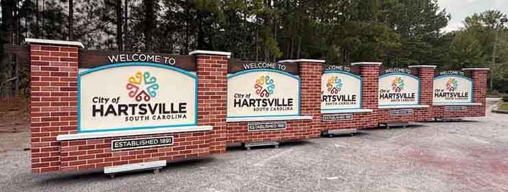 Faux brick and structural wood beams, recessed and embossed graphics for the City of Hartsville, SC. We can make multiple units and offer Municipality Discounts.