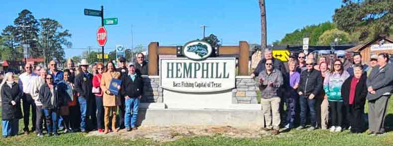 City Council Newspaper Picture of Hemphill City Entrance Sign Installed.