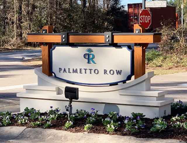Community Entrance Sign Monument with Faux Wood Beams and Iron Hardware