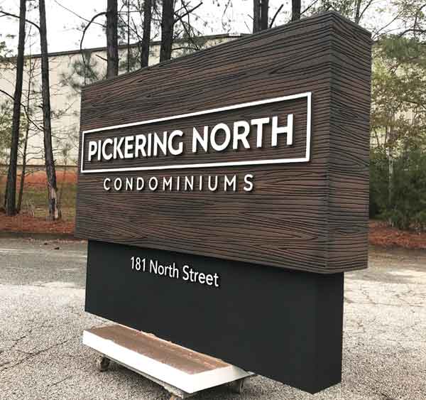 Modern Sign Monument Design with Faux Wood Panel